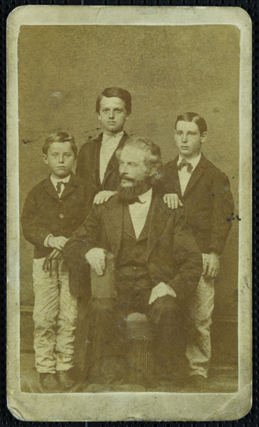 Emil Baur (sitting) originally called the colony he founded in Michigan's Thumb "the Christian German Agricultural and Benevolent Society Ora et Labora."