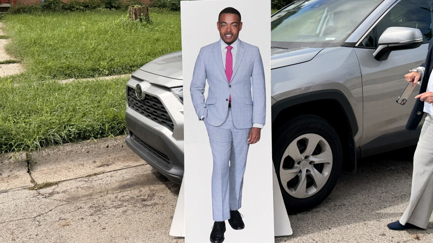 A cardboard cutout of Columbus City Council President Shannon Hardin leans against a car at the announcement of his run for Columbus mayor on August 20, 2026.