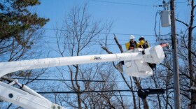 DTE workers repairing a line