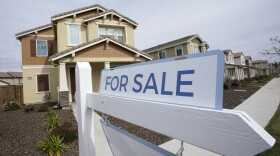 FILE - A "for sale" sign is posted in front of a home in Sacramento, Calif., March 3, 2022. The profit margin on median-priced single-family homes and condos nationally soared to 59% in the July-September 2023 quarter, according to a report released Thursday, Oct. 19, 2023, by real estate information provider Attom. (AP Photo/Rich Pedroncelli, File)