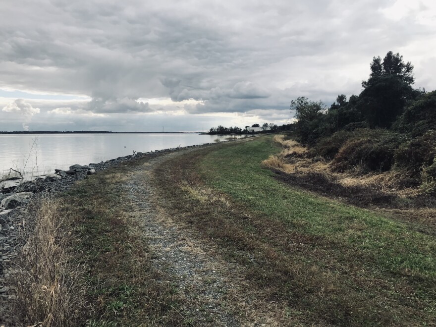 The side of Buttonwood shows a potential path along the river to the Historic District.