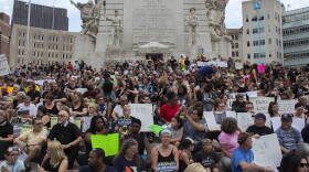 The vigil was hosted by the Indianapolis group Showing Up for Racial Justice.