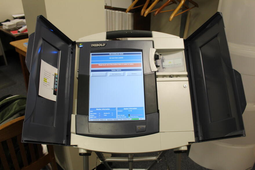 Voters couldn't use voting machines, because computers were unable to log them in as the polls opened at 6 a.m. (STAN JASTRZEBSKI / WBAA NEWS)