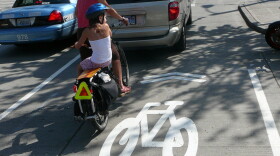 An example of a "sharrow," a painted icon intended to point the way for bikers on shared roads.