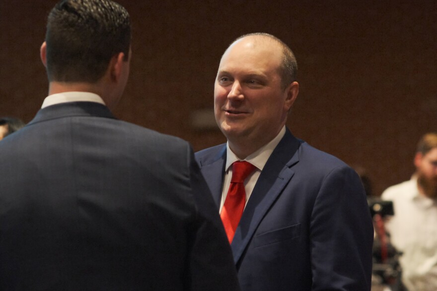 Candidate for Oklahoma Attorney General Jon Echols chats with a constituent during his race announcement event on Feb. 26, 2025, at the Christian Heritage Academy in Del City.