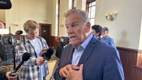 Former congressman Mike Rogers, Republican candidate for Michigan's open U.S Senate seat, takes questions from the press at a business event in Traverse City on Friday, Oct. 23, 2026