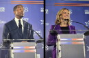 Republican John James and Democrat Jocelyn Benson stand at their lecterns during a gubernatorial debate on October 6, 2026.