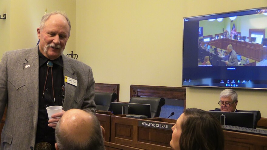 Peoplelaughing at a meeting, talking