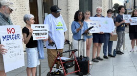 Community advocate Kim Sudderth speaks to the crowd gathered outside Norfolk's Slover library before an event with Lt. Gov. Ghazala Hashmi and local representatives Sept. 8, 2026.