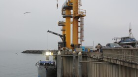 The Port of Port Orford uses cranes to lift and lower fishing boats from the ocean. A hoist, shown here Aug. 5, 2026, lifts seafood and gear from the boats onto the dock.