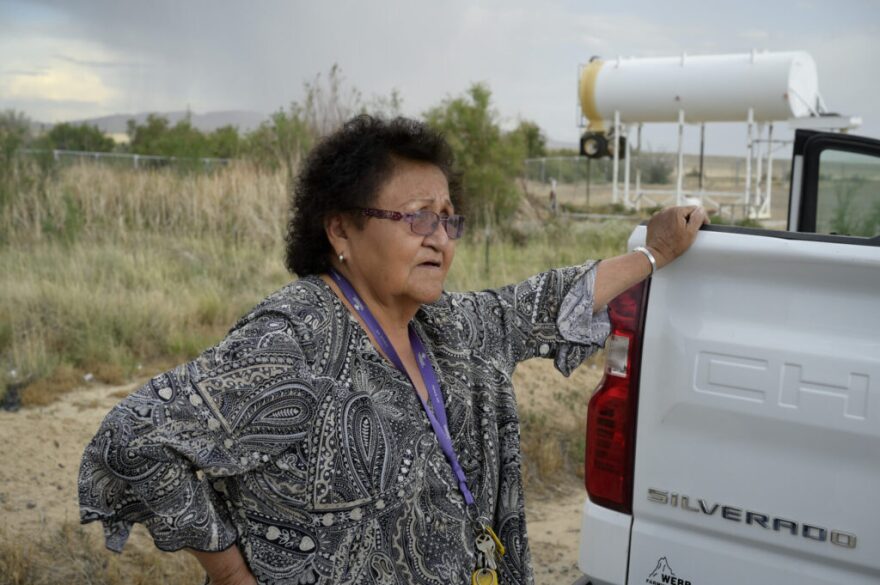 Johnson stands by the tainted well where she used to draw water for her cattle. (Jerry Redfern)