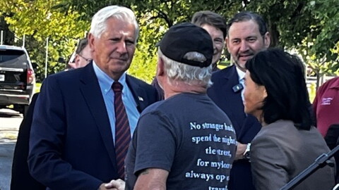 Nassau County Executive Bruce Blakeman, the Republican candidate for New York governor, greets Rick Sabourin of Hamlin on Sept. 18, 2026, in Greece before holding a news conference.