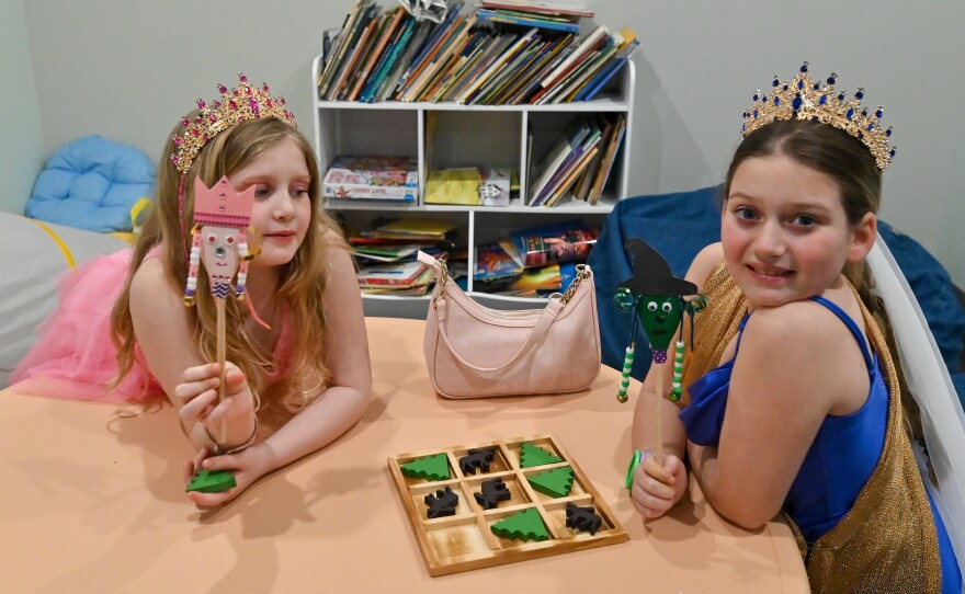 Alica and Ruth Gold made groggers to shake during the story of Esther.