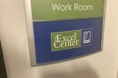 A sign for the Excel Center of Roanoke, at Melrose Plaza in Roanoke, Virginia.