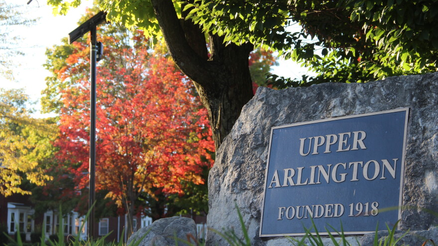 Upper Arlington sign with a Flock camera in the background