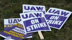 United Auto Workers signs for a strike are shown at the Stellantis Sterling Heights Assembly Plant, in Sterling Heights, Mich., Monday, Oct. 23, 2023.