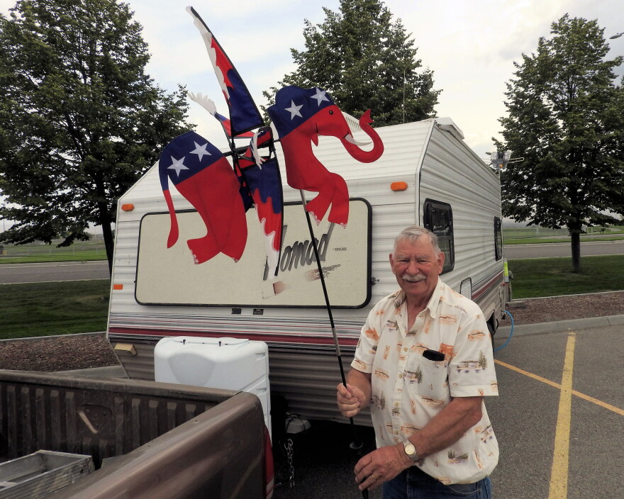 Len Liendsley gets his space set up outside the TRAC Convention Center in Pasco, site of the state Republican convention. 'I just love the party. ... not totally in love with it this year,' he says.
