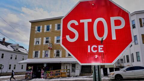 Anti-ICE sentiment is expressed on a traffic sign, Friday, Jan. 23, 2026, in Biddeford, Maine.