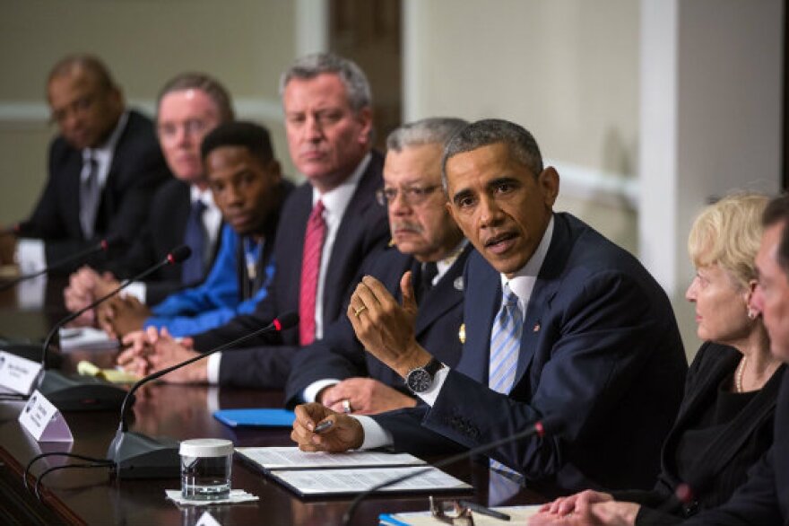 President Barack Obama and Vice President Joe Biden meet with elected officials, community and faith leaders, and law enforcement officials to discuss how communities and law enforcement can work together to build trust to strengthen neighborhoods Dec. 1