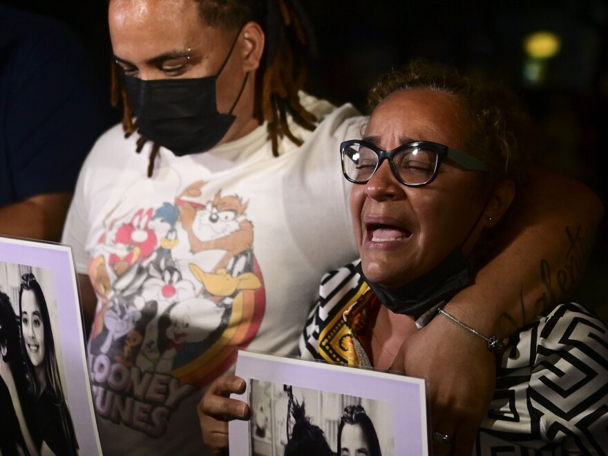 Keila Ortiz, the mother of Keishla Rodriguez, cries out for justice after boxer Felix Verdejo was arrested in connection with the death of her 27-year-old pregnant daughter whose body was found in a lagoon, outside FBI headquarters in San Juan, Puerto Rico, on Sunday.