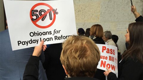 Supporters of a bill that reform payday lending gather at the Ohio Statehouse.