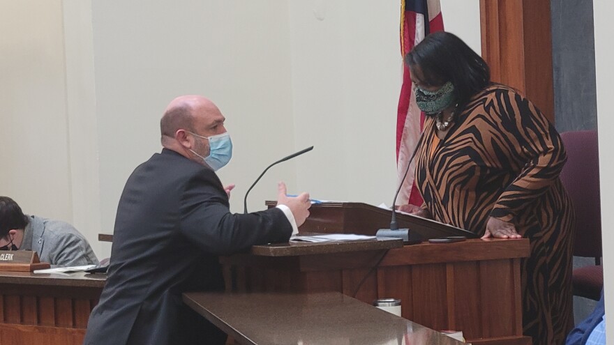 Erie County Legislator Christopher Greene, a Republican, speaks about the county budget with Chairwoman April Baskin, a Democrat, amid a recess during a legislative session Dec. 2. 2021.