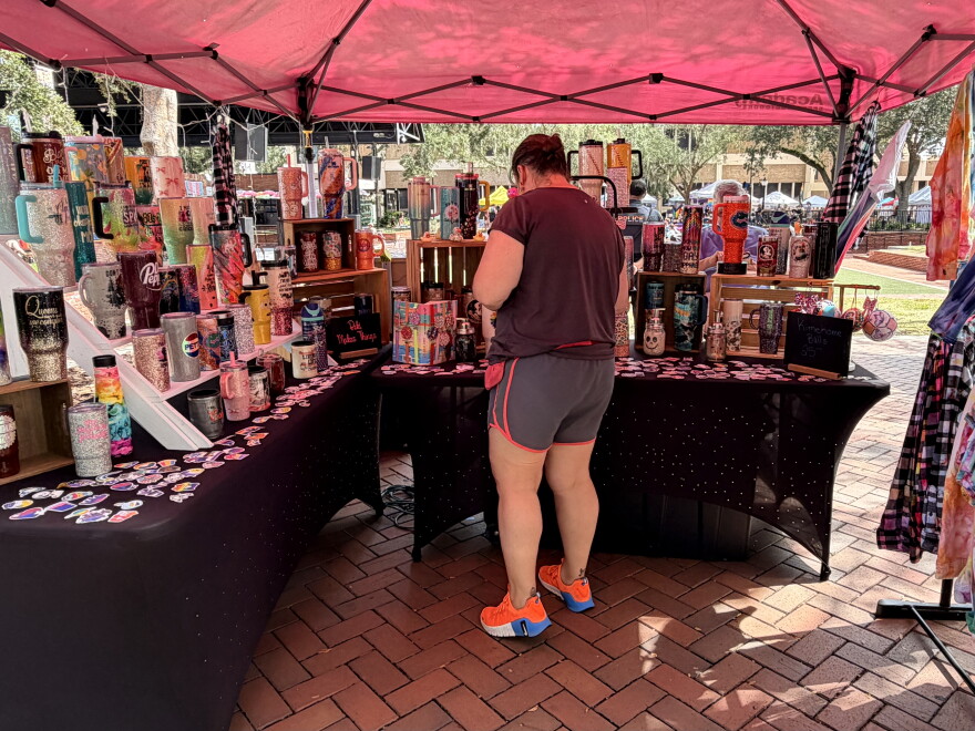 Rebecca Anderson-Orlowski stands by her booth Beki Makes Things at the Gainesville Pride Festival on Saturday, Oct. 3, 2026. (Madison Middleton/WUFT News)