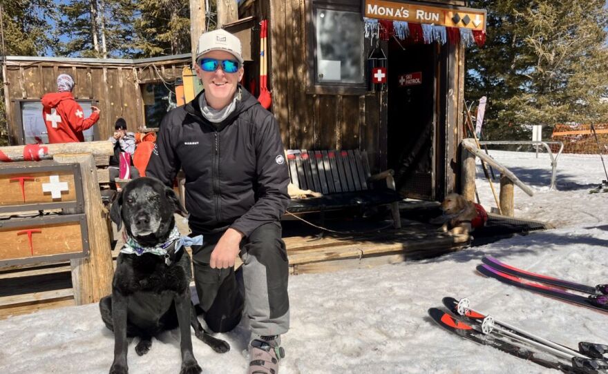 Avalanche rescue dog Mona and Erik Larsen at Mona's retirement party in Telluride, Colorado.