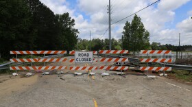Barricades block portion of Wilson Blvd.