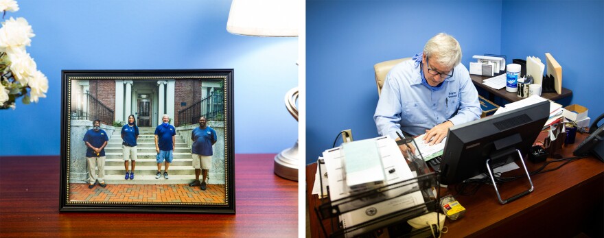 Left: A framed photograph of four of the maintenance and grounds staff features (from left) Charles Dreux, Lea Dunson, Steve Guynn and Robert Smith in Guynn and Smith's office. Right: Steve Guynn, Sayre's director of building and grounds, creates a to-do list for the day at his desk.