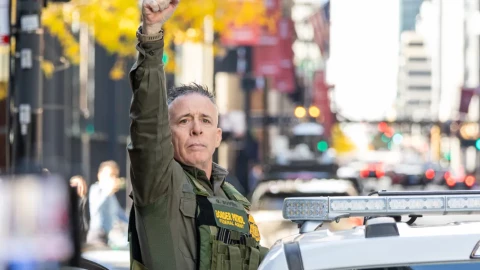 U.S. Customs and Border Patrol Commander Gregory Bovino signals to immigration agents as he leaves the Chicago’s Dirksen Federal Courthouse on Oct. 28.