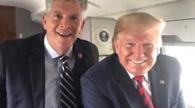 Rep. Darin LaHood (R-Dunlap) and President Donald Trump aboard Air Force One in 2019.