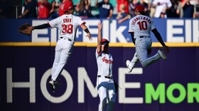 From left, Cleveland Guardians' Steven Kwan, Petey Halpin and Daniel Schneemann celebrate after winning Game 2 of the American League Wild Card baseball playoff series.