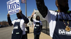 Campaign workers encourage passers-by to vote for 19th Ward incumbent Marlene Davis. (March 7, 2017)