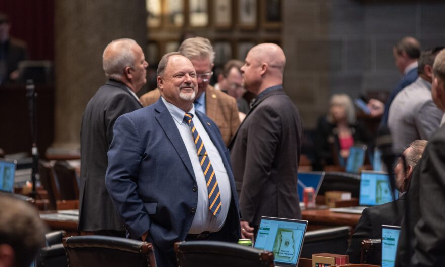 State Rep. Ed Lewis, R-Moberly, stands on the House floor in preparation for a day of voting in special session.