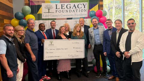 Representatives from the seven organizations awarded the "Love Where You Live" grant.