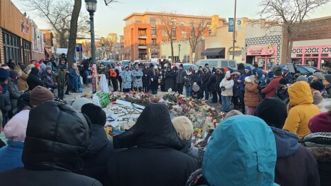 Clergy, including Kentucky Reverend Kent Gilbert, pray alongside community members at the site of protestor Alex Pretti's death in Minneapolis, MN.