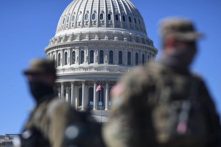 Members of the National Guard are seen patrolling near the US Capitol Building on Capitol Hill in Washington, DC.