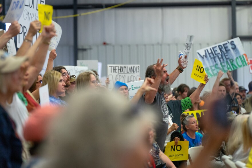 Protestors speak out during a special meeting of the Box Elder County Commission at the BEC Fairgrounds in Tremonton, May 4, 2026.
