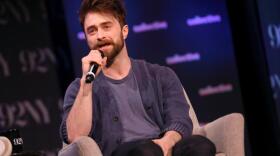 Actor Daniel Radcliffe appears onstage to discuss the Broadway play "Every Brilliant Thing" at The 92nd Street Y, Thursday, April 9, 2026, in New York. (Andy Kropa/Invision/AP)