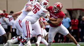 Stephen Daley battles a Wisconsin offensive lineman. 