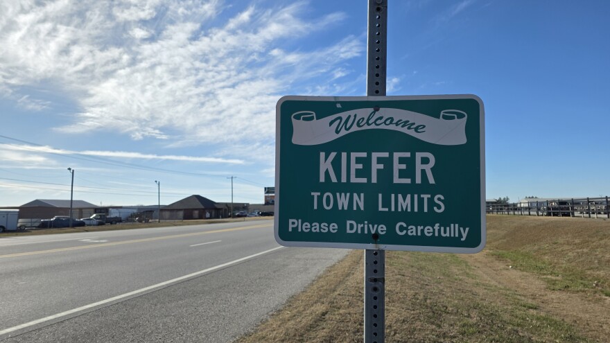A road sign indicating the town limits of Kiefer, Oklahoma.