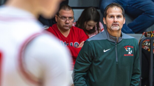 Lincoln High School assistant coach Eric Ewald watches the action Friday during a game against Chatham Glenwood at Chatham. Ewald will be inducted in May into the Illinois Basketball Coaches Association Hall of Fame at Illinois State's CEFCU Arena.