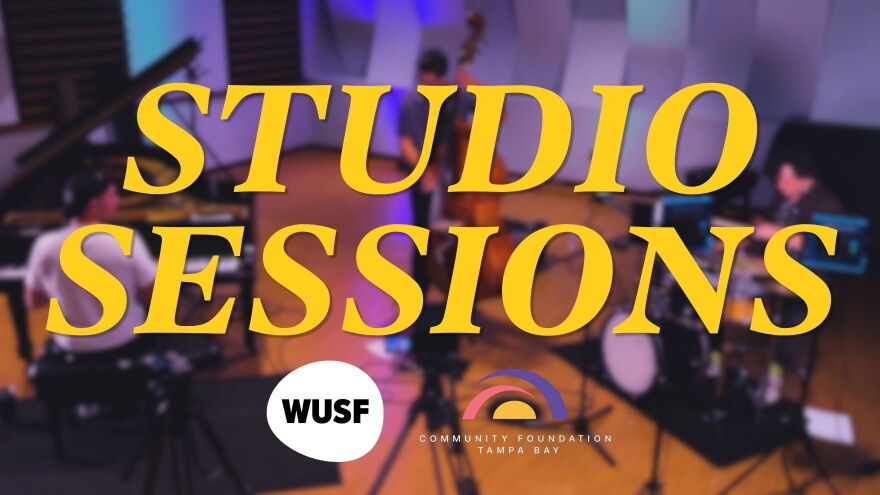 Art image says Studio Sessions in yellow with a blurred-out picture of an overhead view of a stage in the background