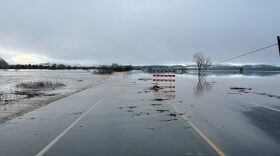 Flooding on Oregon Route 42 on March 17, 2025 near Coos Bay. Oregon Gov. Tina Kotek declared an emergency March 19 due to heavy rains which have washed out roads, cut power and caused at least one death.