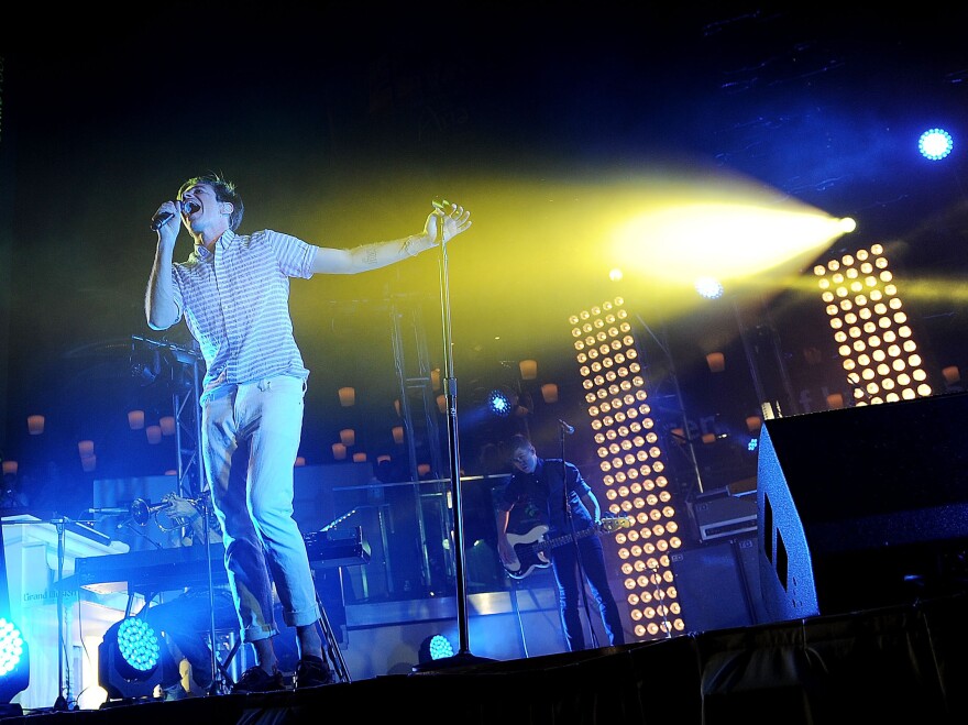 Singer Nate Ruess of fun. performs in Las Vegas. Behind Ruess are lighting director Jackie Finney's favorite new tools: towers of white lights called kryptons.