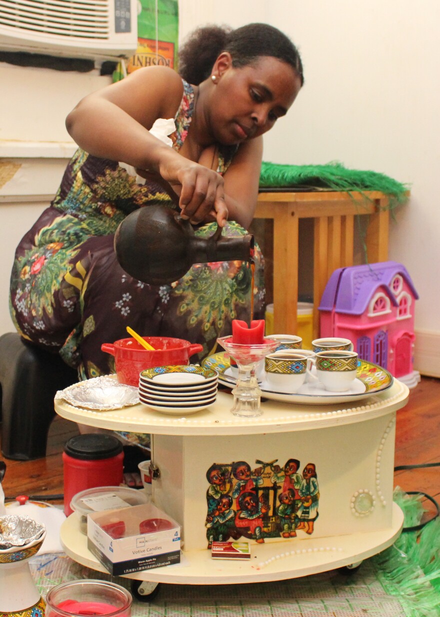 Trihas Kefele Pours Coffee For Guests - - Photo by Emily Hilliard .jpg.jpg