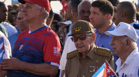 Raúl Castro (center, in green fatigues) at an international workers day celebration in Havana on May 1, 2026, with Cuban President Miguel Díaz-Canel (to Castro's right).