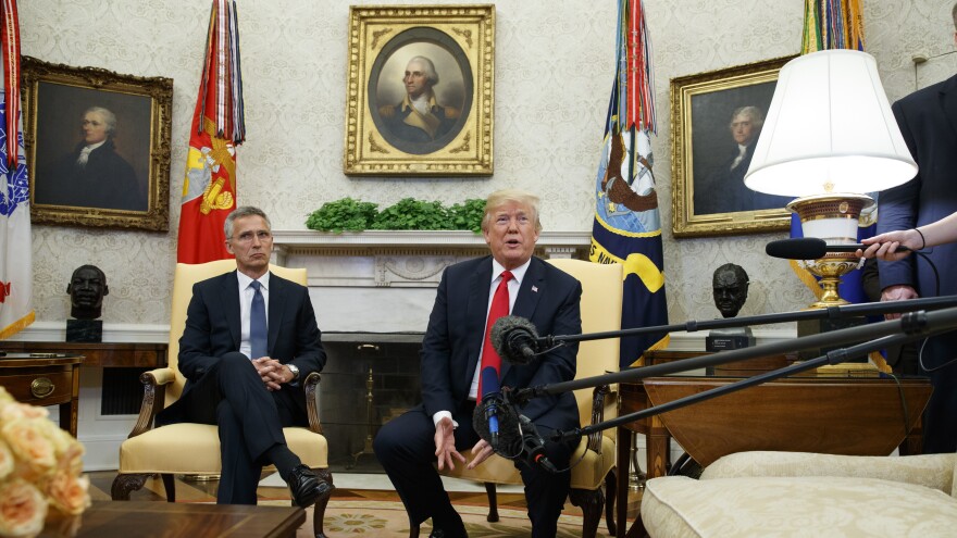 President Trump meets with NATO Secretary General Jens Stoltenberg in the Oval Office of the White House on Thursday.