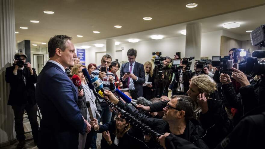 Nenad Golcevski, spokesperson for the International Criminal Tribunal for the former Yugoslavia, addresses the media Wednesday at The Hague, Netherlands, hours after Slobodan Praljak declared his innocence and apparently consumed poison in the courtroom.